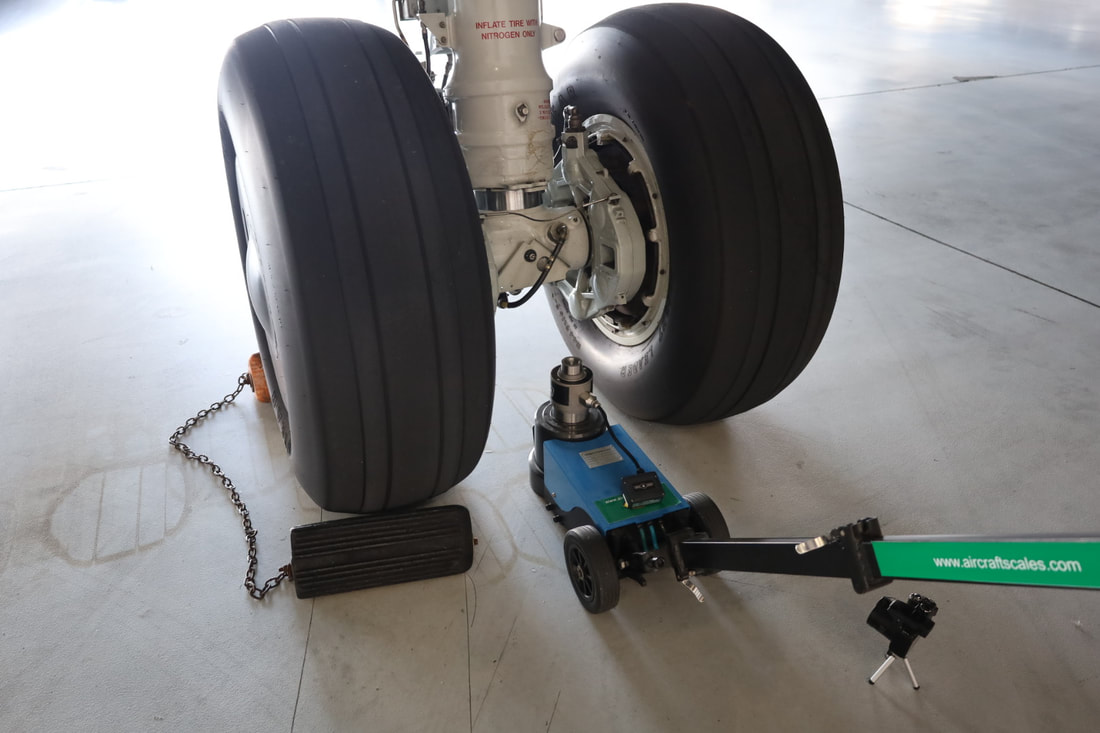 Boeing 737 aircraft weighing procedure, Boeing 737 aircraft weighing system, Boeing aircraft 737 weighing scales, weighing a Boeing 737, under axle weighing system, under axle Boeing weighing system, Boeing P8 weighing system, Boeing P8 under axle weighing system, C4ISR aircraft weighing system, C4ISR aircraft scales, C4ISR under axle weighing system, C4ISR MRO weighing equipment, C4ISR weighing scales, C4ISR weighing equipment, Boeing C4ISR aircraft weight and balance system