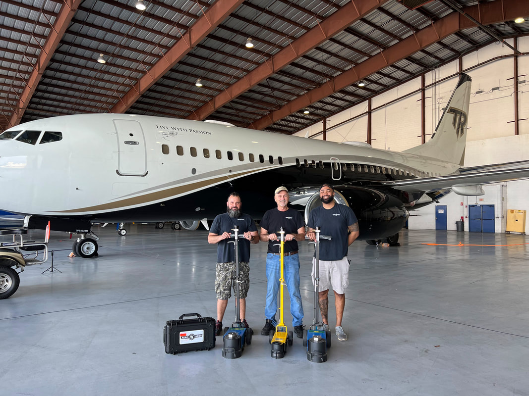 Boeing 737 aircraft weighing procedure, Boeing 737 aircraft weighing system, Boeing aircraft 737 weighing scales, weighing a Boeing 737, under axle weighing system, under axle Boeing weighing system, how to weigh a Boeing jet, how to weigh an A320, weighing an A320